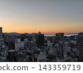 Takamatsu city bathed in the sunset, with a view towards Takamatsu Port. 143359719