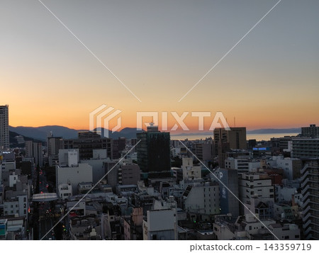 Takamatsu city bathed in the sunset, with a view towards Takamatsu Port. Takamatsu city bathed in the sunset, with a view towards Takamatsu Port. 143359719