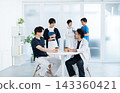 Medical staff chatting while drinking coffee in the break area. 143360421