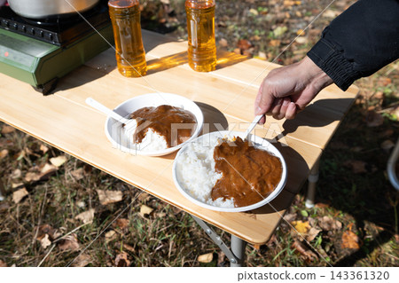 Curry rice made at the camp Curry rice made at the camp 143361320