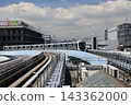 A Yurikamome train approaching Shijo-mae Station. 143362000