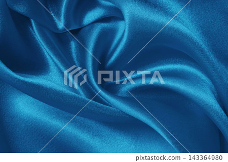 Blue fabric cloth texture for background and design art work, beautiful crumpled pattern of silk or linen. Blue fabric cloth texture for background and design art work, beautiful crumpled pattern of silk or linen. 143364980