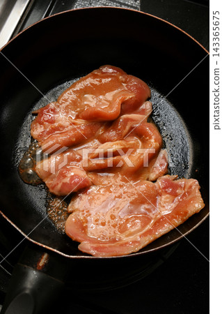 Ginger grilled cooking scene Ginger grilled cooking scene 143365675
