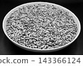 beautiful texture ripe of natural sunflower seeds on background 143366124