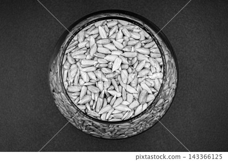 beautiful texture ripe of natural sunflower seeds on background 143366125