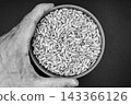 beautiful texture ripe of natural sunflower seeds on background 143366126