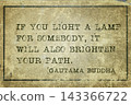 light a lamp Buddha 143366722