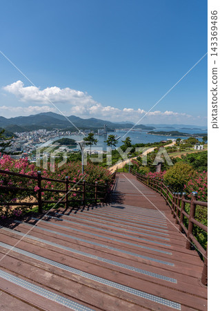 Wooden Stairway Overlooking Wando Harbor and Coastal City in South Korea Wooden Stairway Overlooking Wando Harbor and Coastal City in South Korea 143369486