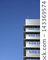 The outer wall of the building and the blue sky 143369574