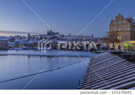 Prague Castle and Charles Bridge in winter evening Prague Castle and Charles Bridge in winter evening 143370091