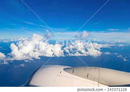 Blue sky seen from an airplane Blue sky seen from an airplane 143371126