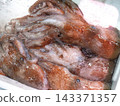 Octopuses on display at the market in Tokyo 143371357