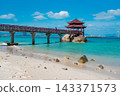 Famous Lovers Bridge and Chinese pavilion on Wuzhizhou Island beach in Sanya Hainan. Tropical paradise seascape summer vacation 143371573