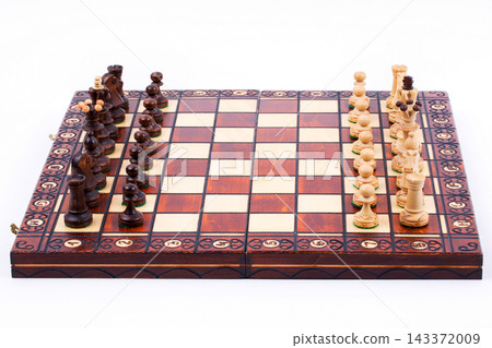 Chess pieces on the chessboard Chess pieces on the chessboard 143372009