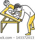 A man working on a drafting board. 143372013
