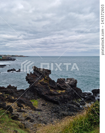 Yongduam Rock is a famous tourist attraction in Jeju Island. Yongduam Rock is a famous tourist attraction in Jeju Island. 143372603
