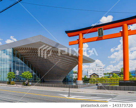 (4:3) A view of the Shizuoka Prefectural Mt. Fuji World Heritage Center and a large red torii gate under a clear blue sky in Fujinomiya City, Shizuoka Prefecture. (4:3) A view of the Shizuoka Prefectural Mt. Fuji World Heritage Center and a large red torii gate under a clear blue sky in Fujinomiya City, Shizuoka Prefecture. 143373720