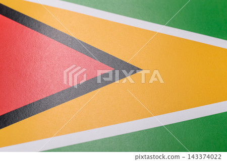 Guyana flag as a symbol of national independence. The Guyana flag Guyana flag as a symbol of national independence. The Guyana flag 143374022
