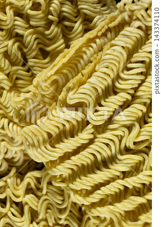 Detailed texture of raw wavy instant ramen noodle block 143374110
