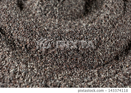 Crushed poppy seed mix pile surface close up shot Crushed poppy seed mix pile surface close up shot 143374118