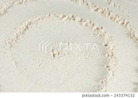 Organic wheat flour surface pattern close up top view 143374132