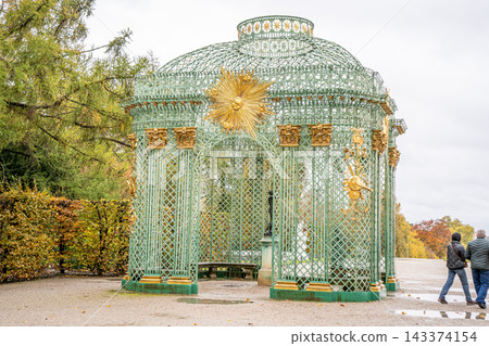 Openwork metal gazebo in Sanssouci Park in Potsdam, Germany Openwork metal gazebo in Sanssouci Park in Potsdam, Germany 143374154