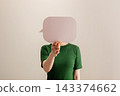 Woman holding a blank speech bubble,freedom of expression, communication 143374662