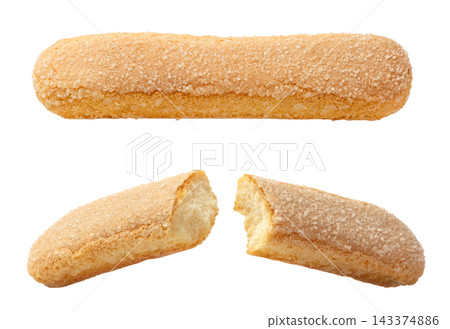 Savoiardi cookies whole and broken in half on a white background. Isolated Savoiardi cookies whole and broken in half on a white background. Isolated 143374886