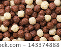 Sweet cereal balls close-up background. Top view 143374888