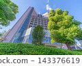 Exterior view and facility nameplate of the National Cancer Center Hospital, against a blue sky [Tsukiji, Chuo-ku, Tokyo] 143376619