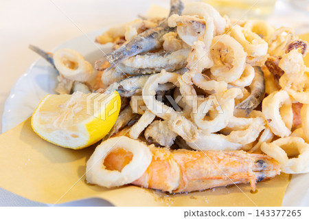 Delicious seafood fritters Delicious seafood fritters 143377265
