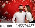Romantic couple embracing on Christmas background 143379887
