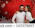 Romantic couple embracing on Christmas background 143379897