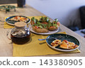 Breakfast table with iced tea and open face sandwiches 143380905