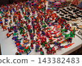 Colorful handcrafted wooden animal figurines at mexican souvenir market 143382483