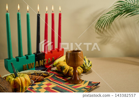 Kwanzaa kinara with candles and unity cup Kwanzaa kinara with candles and unity cup 143382557