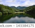 The natural scenery of the forests surrounding Lake Daigenta and the mountains in Yuzawa Town, Niigata Prefecture. 143384175