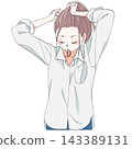 A woman with her hair tied up 143389131