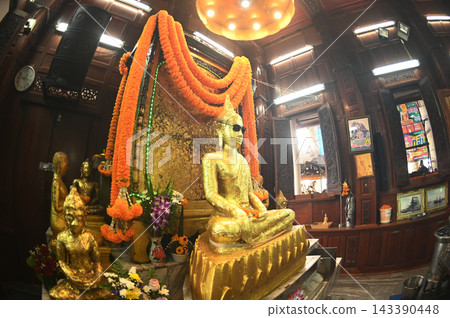 The Buddha image in the *ubosot* (ordination hall) at Wat Krok Krak known as "Luang Pho Pu" wears dark sunglasses, making it unlike any other Buddha image in Thailand. The Buddha image in the *ubosot* (ordination hall) at Wat Krok Krak known as "Luang Pho Pu" wears dark sunglasses, making it unlike any other Buddha image in Thailand. 143390448
