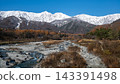 Snow-capped Northern Alps and trees with autumn foliage in Hakuba Village, Nagano Prefecture 143391498