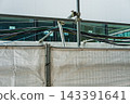 Temporary fences and cables at a construction site 143391641