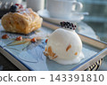 Gourmet mousse cake and puff pastry desserts served on a tray in a luxury cafe 143391810