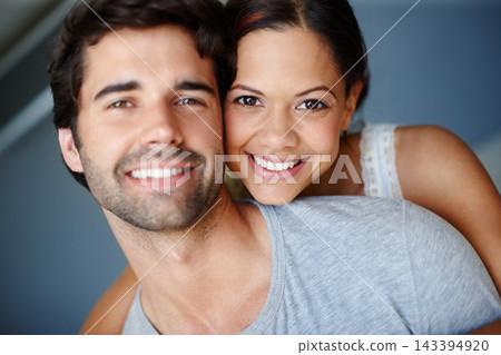 Hug, portrait and smile with couple in bedroom of home together for bonding, marriage or support. Face, love or trust with happy man and woman in apartment to relax for morning or weekend time off Hug, portrait and smile with couple in bedroom of home together for bonding, marriage or support. Face, love or trust with happy man and woman in apartment to relax for morning or weekend time off 143394920