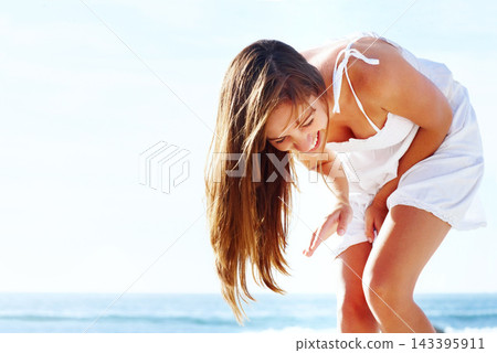 Joke, beach or happy woman on holiday laughing to relax on vacation in outdoor break or paradise in Ibiza. Smile, comdey or funny girl with confidence at ocean or sea with peace, wellness or travel Joke, beach or happy woman on holiday laughing to relax on vacation in outdoor break or paradise in Ibiza. Smile, comdey or funny girl with confidence at ocean or sea with peace, wellness or travel 143395911