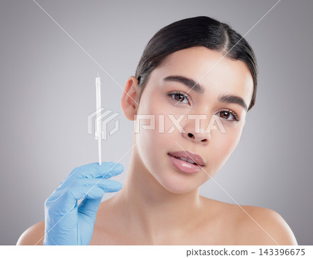 Woman, portrait and plastic surgery, beauty and injection in studio for lip filler, skincare and collagen. Spa treatment, medical and cosmetics with face of person in grey background for facial Woman, portrait and plastic surgery, beauty and injection in studio for lip filler, skincare and collagen. Spa treatment, medical and cosmetics with face of person in grey background for facial 143396675