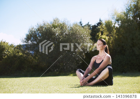 Woman, grass and meditation in nature for calm, breathing or relaxation in sunshine. Female person, yoga or zen outdoors for wellness, balance and peace or spiritual energy in park with eyes closed 143396878