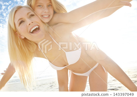 Airplane, mother and child with piggyback at beach for summer travel, holiday and freedom together. Nature, smile and woman with girl kid by ocean for vacation, adventure and weekend fun in Cancun Airplane, mother and child with piggyback at beach for summer travel, holiday and freedom together. Nature, smile and woman with girl kid by ocean for vacation, adventure and weekend fun in Cancun 143397049
