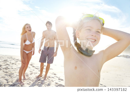 Excited, family and child relax on beach with snorkeling goggles for adventure and travel on vacation. Holiday, journey and kid with parents in Florida, summer or thinking of swimming with safety Excited, family and child relax on beach with snorkeling goggles for adventure and travel on vacation. Holiday, journey and kid with parents in Florida, summer or thinking of swimming with safety 143397182