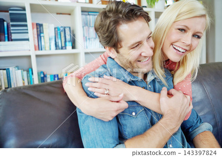 Smile, embrace and happy couple on sofa with love, care and bonding in home lounge. Hug, man and woman on couch relaxing, romantic and enjoying conversation, relationship and weekend in living room Smile, embrace and happy couple on sofa with love, care and bonding in home lounge. Hug, man and woman on couch relaxing, romantic and enjoying conversation, relationship and weekend in living room 143397824