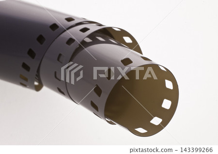 Vintage Film Strip Close-Up on White Background Vintage Film Strip Close-Up on White Background 143399266